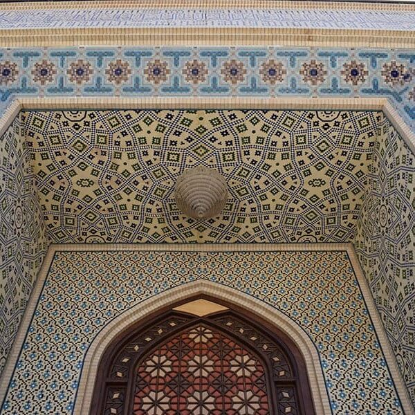 Moroccan themed seamless glass mosaic Marrakesh pattern. A bold dark blue mosaic dome. A mix of Islamic mosaic patterns create the focal point of the entry gallery. Custom handcrafted by MEC.