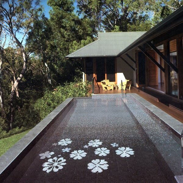 Custom Pools MEC | Glass mosaic pool design with black and grey floral elements.