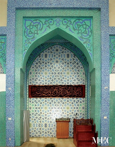 Mehrab niches adorned with turquoise and blue Moroccan mosaic tile design