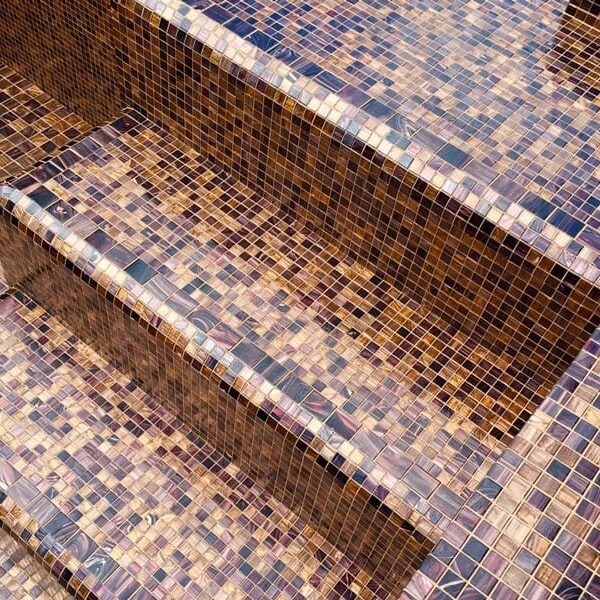 A rich brown glass mosaic tile blend with MEC’s glittery gem glass for pool step tile series.