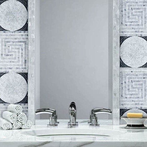 Greco | Marble tile pattern with alternating squares of labyrinth like intricate greek scroll and a solid circle.