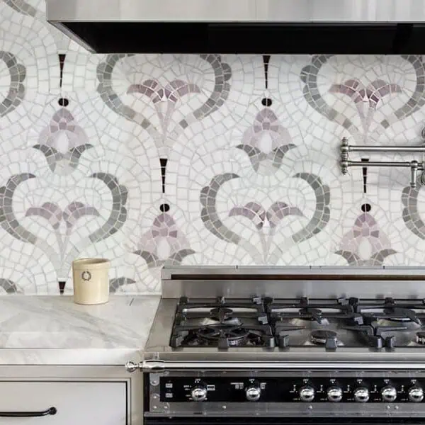 Decorative handcrafted mosaic tile backsplash art featuring simplified European motifs