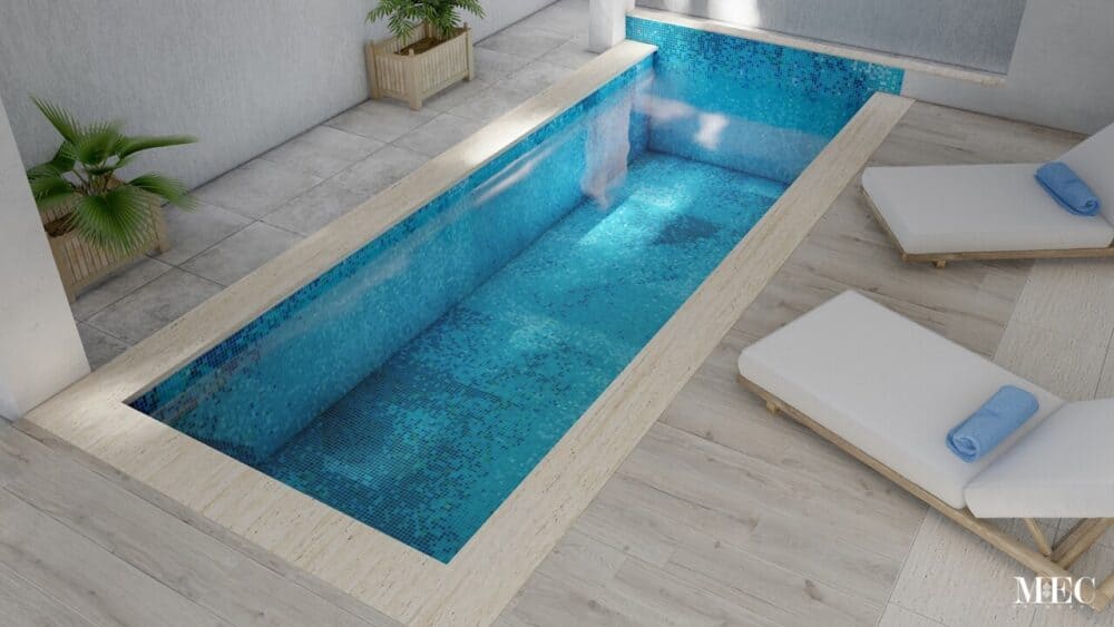 A blue glass mosaic pool tiles with a subtle twist – a digitally created PIXL abstract pattern.