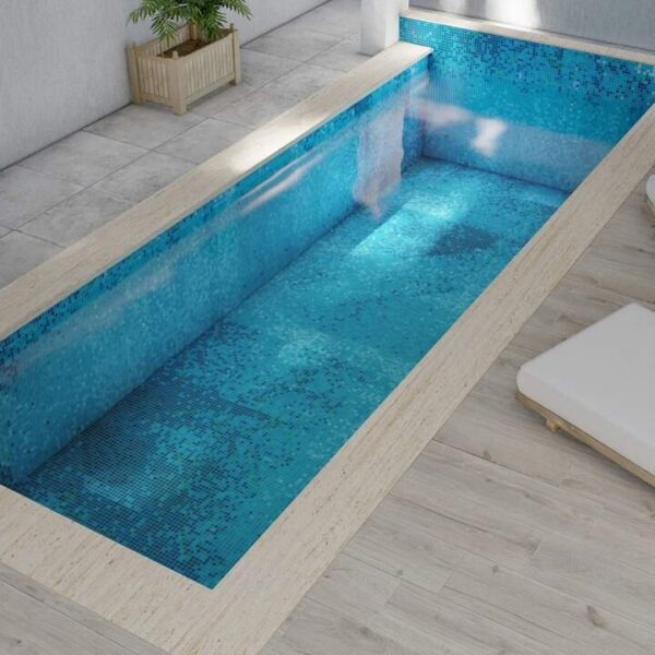 A blue glass mosaic pool tiles with a subtle twist – a digitally created PIXL abstract pattern.