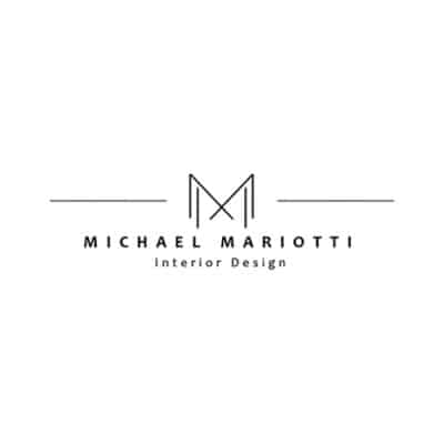 Elegant black logo for Michael Mariotti Interior Design featuring a stylized "M" between horizontal lines.