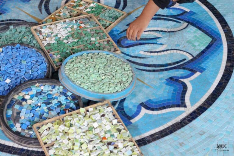 custom pool mosaic production process workshop behind-the-scenes craftsman working