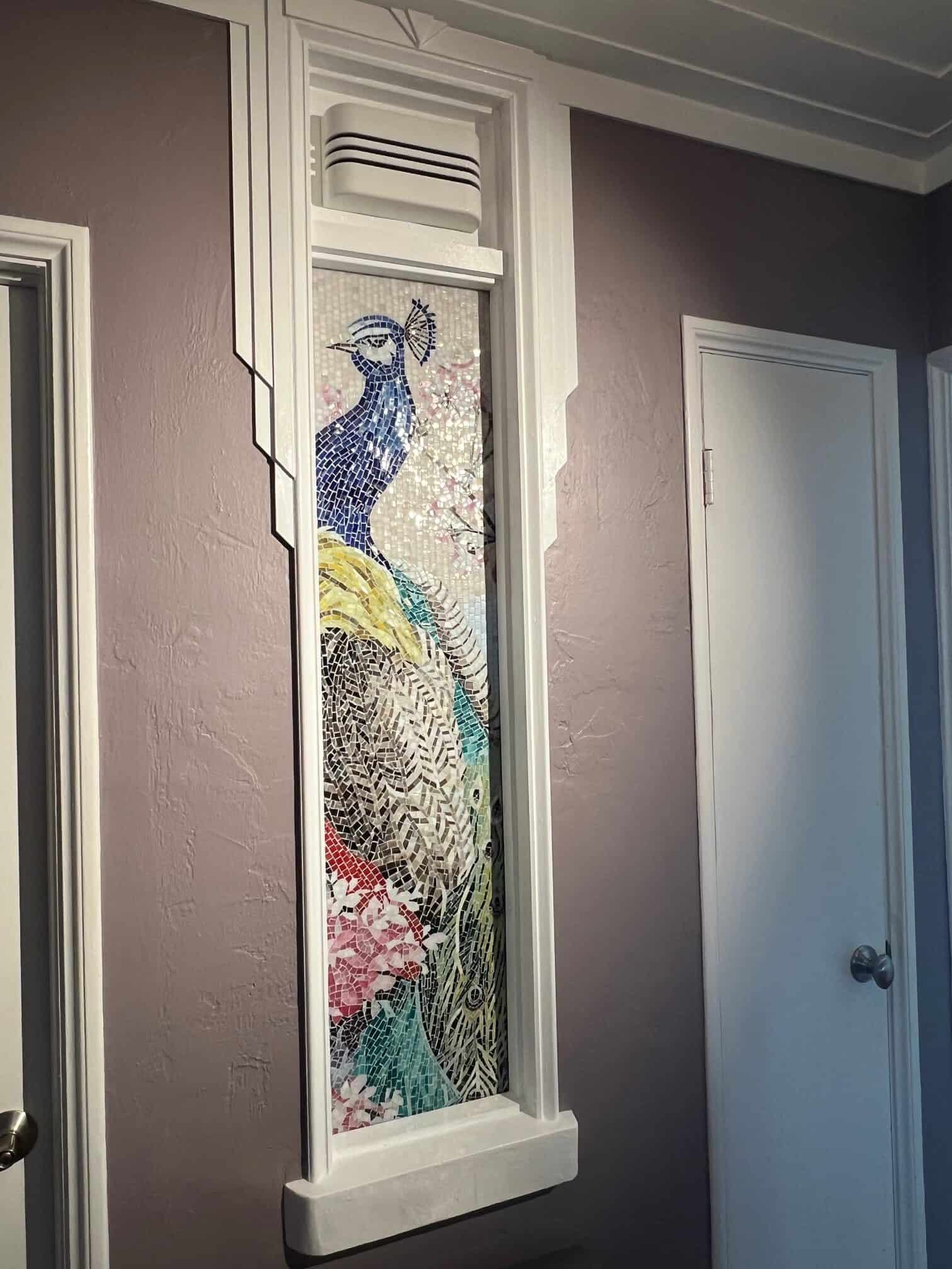 colorful peacock mosaic niche installed in a house im miami