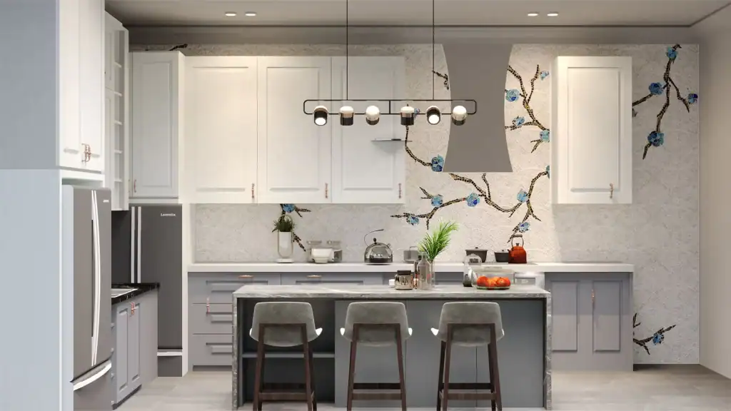Modern kitchen interior with floral mosaic backsplash, pendant lighting, and white cabinetry above gray island.
