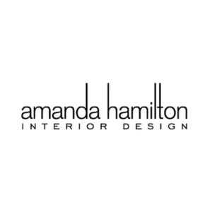 Minimalist Amanda Hamilton Interior Design logo in black text with tall vertical letters on white background.