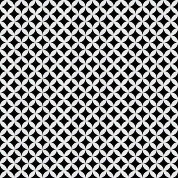 Black and White Petal Mosaic Tile Black and white marble mosaic featuring interlocking petal-shaped tiles arranged in a continuous circular geometric pattern with high contrast.