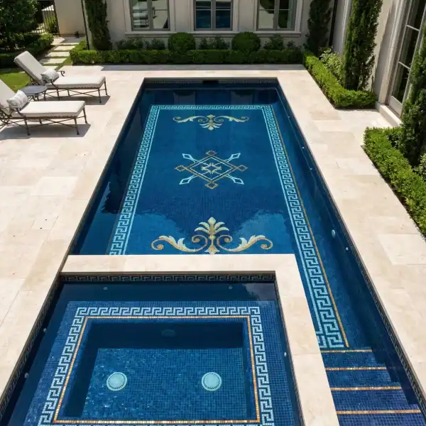 Timeless Greek Key Mosaic Pool Navy blue pool mosaic with Greek key border, gold ornamental motifs, and central geometric emblem design, including matching spa tile border.