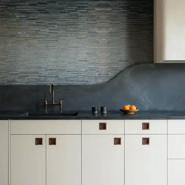 Charcoal Linear Mosaic Backsplash Smoky charcoal ombre mosaic backsplash with slim horizontal mosaic tiles fading from dark grey to light grey, modern kitchen and bathroom wall design.