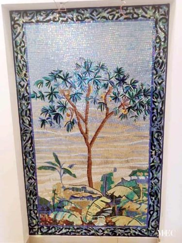 commissioned handmade palm tree mosaic glass tile art wall niche post installation client photo